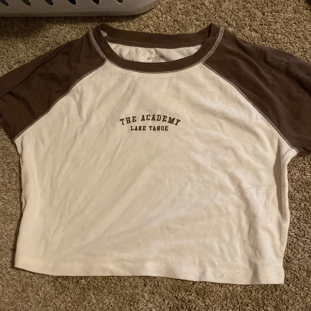 White and brown tee